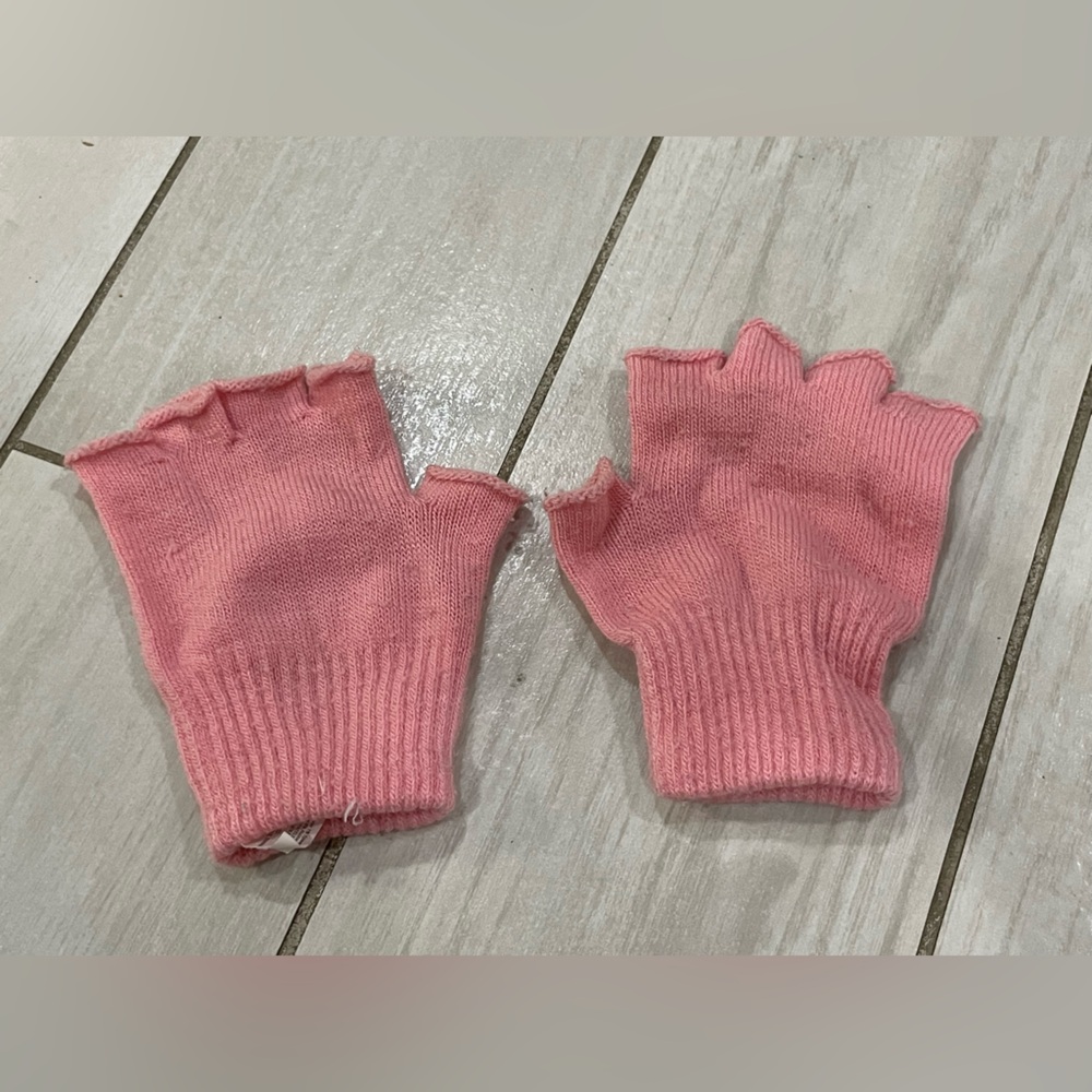 Pink fingerless gloves